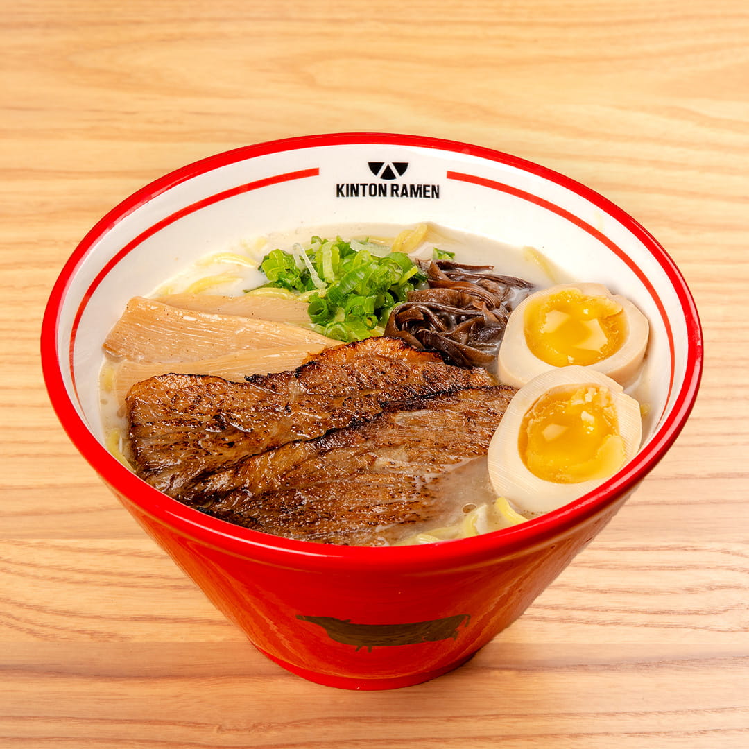 A bowl of Beef Original ramen, featuring tender beef slices, savory broth, and fresh toppings, served at Kinton Ramen.