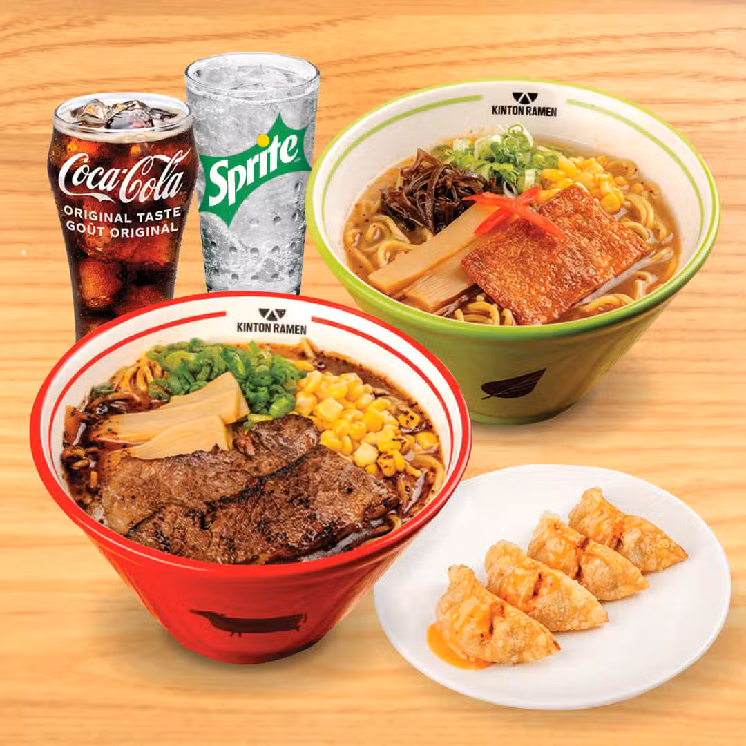 A Kinton Ramen meal set for two, featuring a variety of ramen bowls, fresh toppings, a portion of gyoza and 2 drinks of your choice, perfect for sharing a flavourful dining experience.